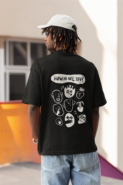 A model wearing a black oversized tshirt with the text 'how hi are you' with faces making different expressions, indian streetwear, desi designs, stoner designs